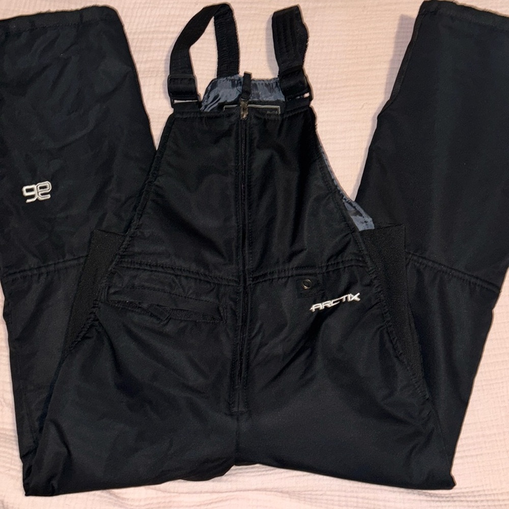 Boys Arctix snow bib overalls size small.